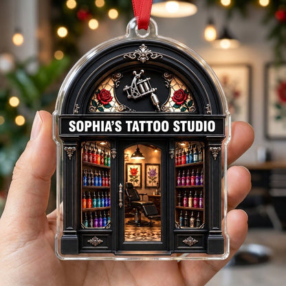 Arched black storefront tattoo ornament with silver machine, stained-glass roses, ink bottles, and a 'TATTOO STUDIO' sig