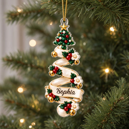 Acrylic ornament shaped around two green gem-style Christmas trees with holly, berries and names Oliver and Emma.