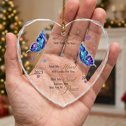 Heart glass ornament with two stained-glass butterflies, dotted heart trails, snowflakes, and a memorial quote.