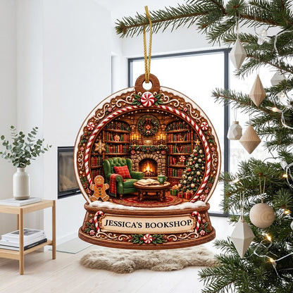 Snow globe ornament with candy-cane frame, cozy book-filled library, fireplace, tree, and 'JESSICA'S BOOKSHOP' nameplate