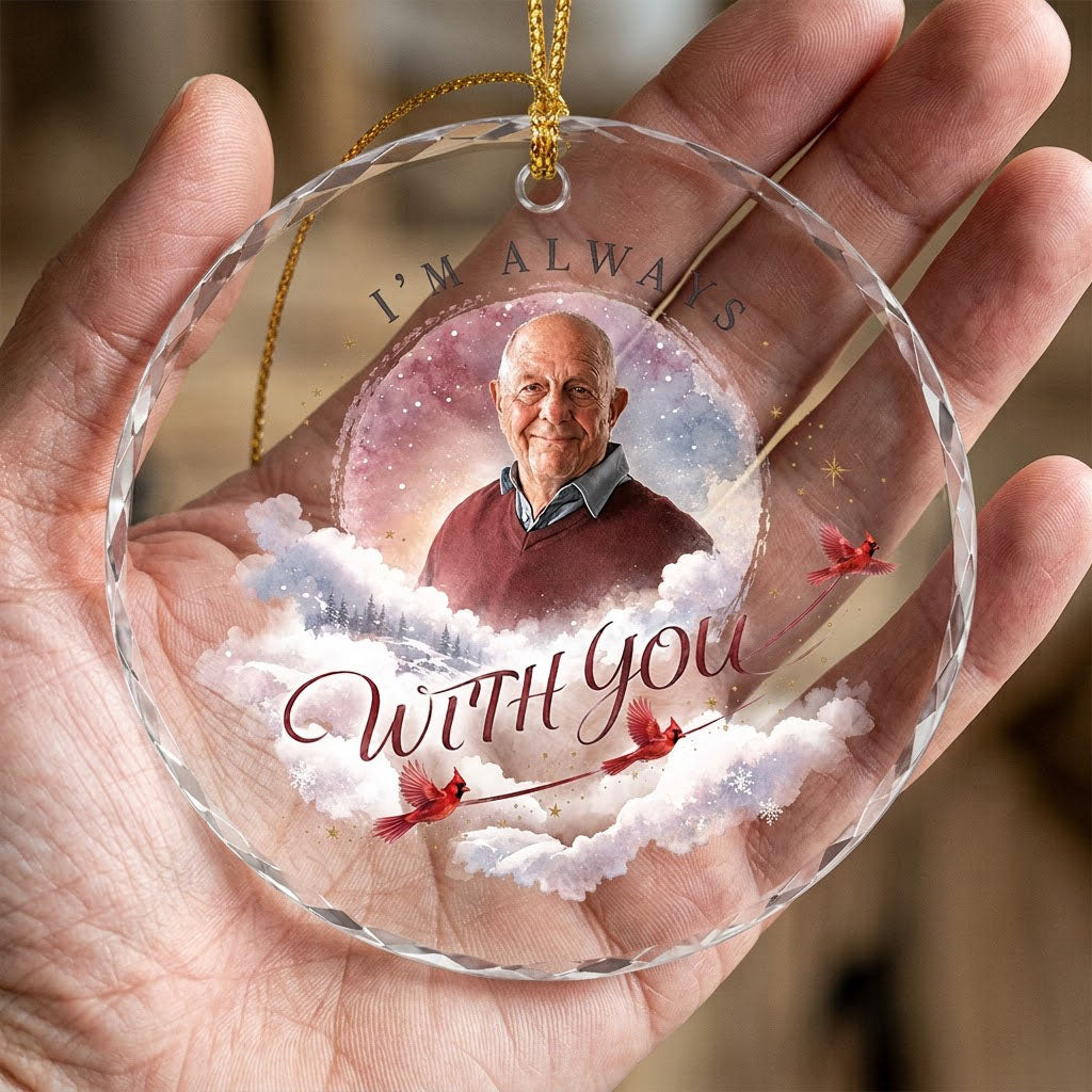 Round faceted glass ornament with "I'm Always With You", custom photo, watercolor clouds, stars, pines, and three red ca