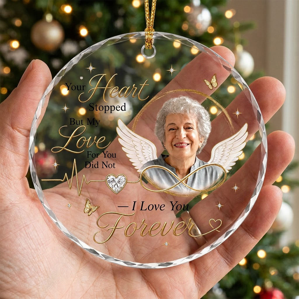 Round ornament with angel wings, photo circle, infinity symbol, heartbeat line to heart, and butterflies.