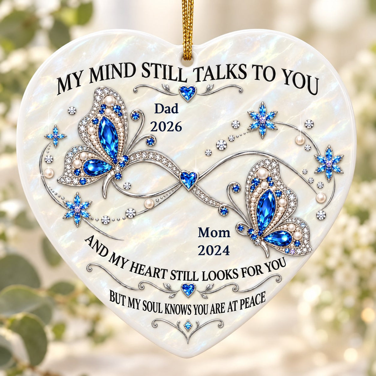 Heart ceramic ornament with blue jeweled butterflies, a silver infinity, and quote 'My Mind Still Talks To You'.
