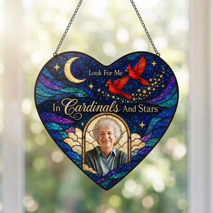 Heart-shaped stained glass suncatcher with night sky, moon, stars, two red cardinals, and a golden photo frame.
