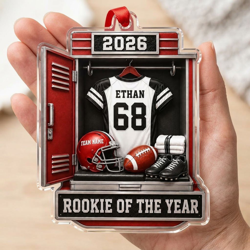 Acrylic ornament shaped like a football locker with jersey, red helmet, ball, towels and ROOKIE OF THE YEAR banner.