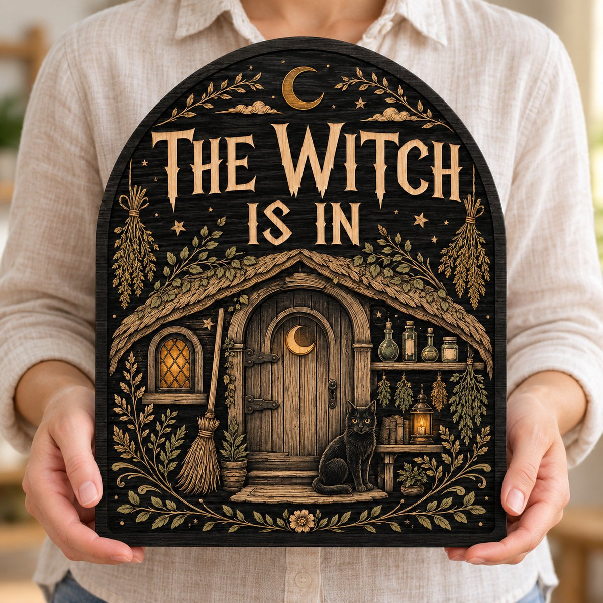 Arch wood sign with "THE WITCH IS IN", witch cottage, black cat, broom, herbs and lantern details.