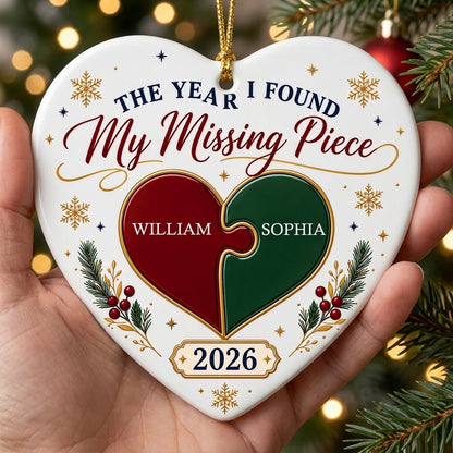 Heart ceramic ornament with red and green interlocking puzzle heart, gold snowflakes and stars, pine sprigs, and custom 