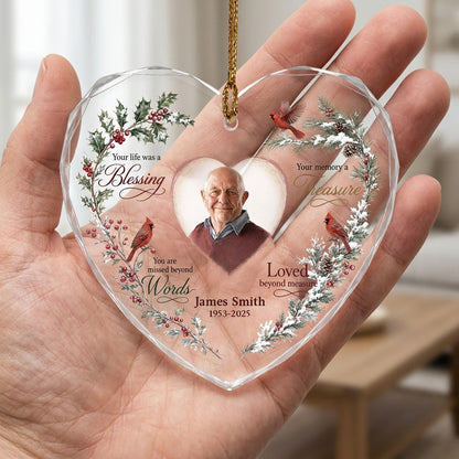 Heart glass ornament with a photo, red cardinals, and a winter wreath of pine, holly, berries, and pinecones.