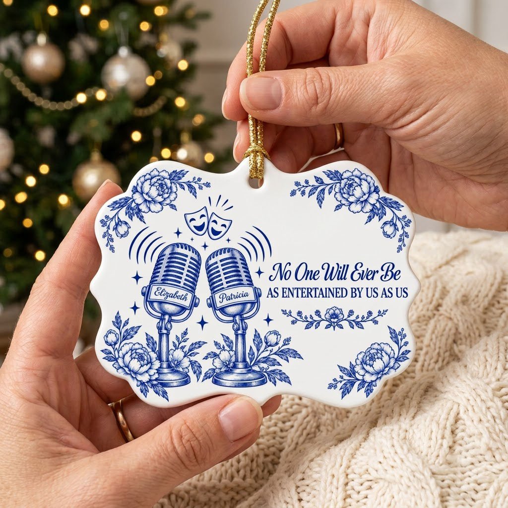 White ceramic ornament with cobalt blue vintage microphones, comedy and tragedy masks, stars and florals with two names.