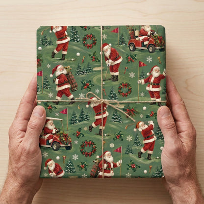 Green golf-themed Christmas wrapping paper with Santa swinging, a red golf cart, flags, balls, pine trees, wreaths and s