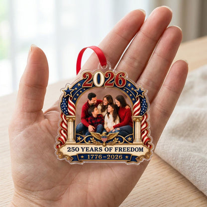 Ornate arched acrylic ornament with 2026, flag-draped columns, eagle emblem, and a central family photo frame