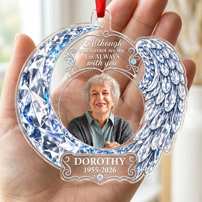 Acrylic ornament with blue crystal-look crescent moon, angel wing, circular photo frame and memorial quote.