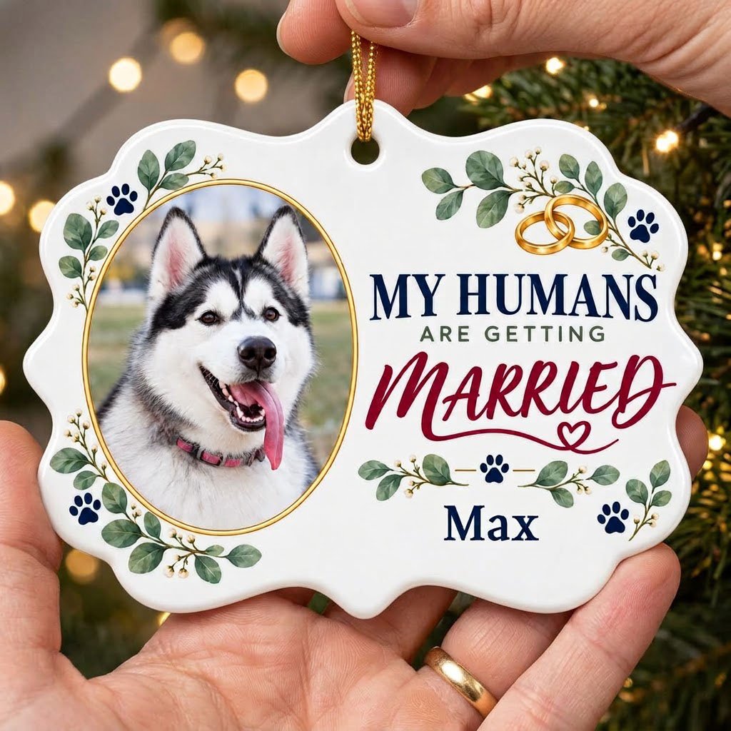 Scalloped medallion ornament with dog photo, eucalyptus, paw prints, and 'MY HUMANS ARE GETTING MARRIED' text.