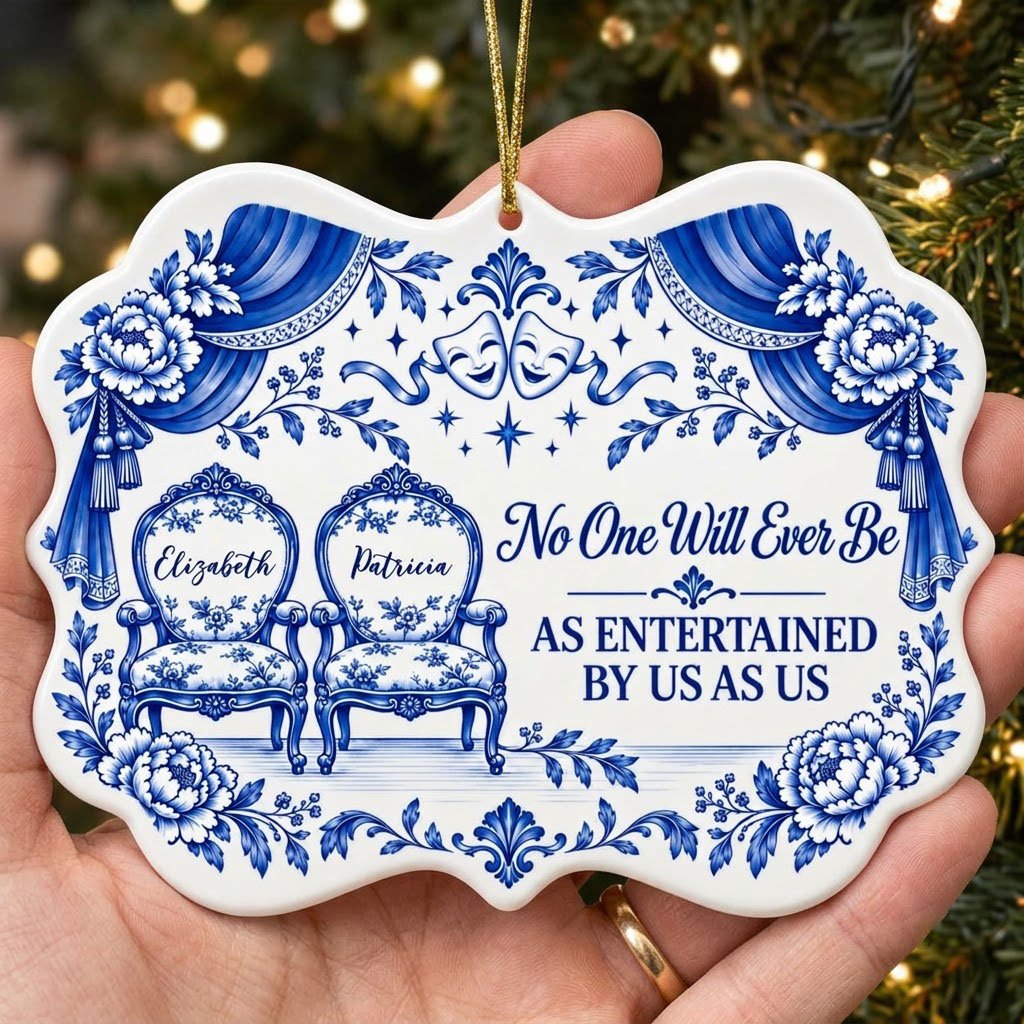 Blue-and-white ceramic ornament with theater masks, vintage chairs, Delft florals, and draped curtains.