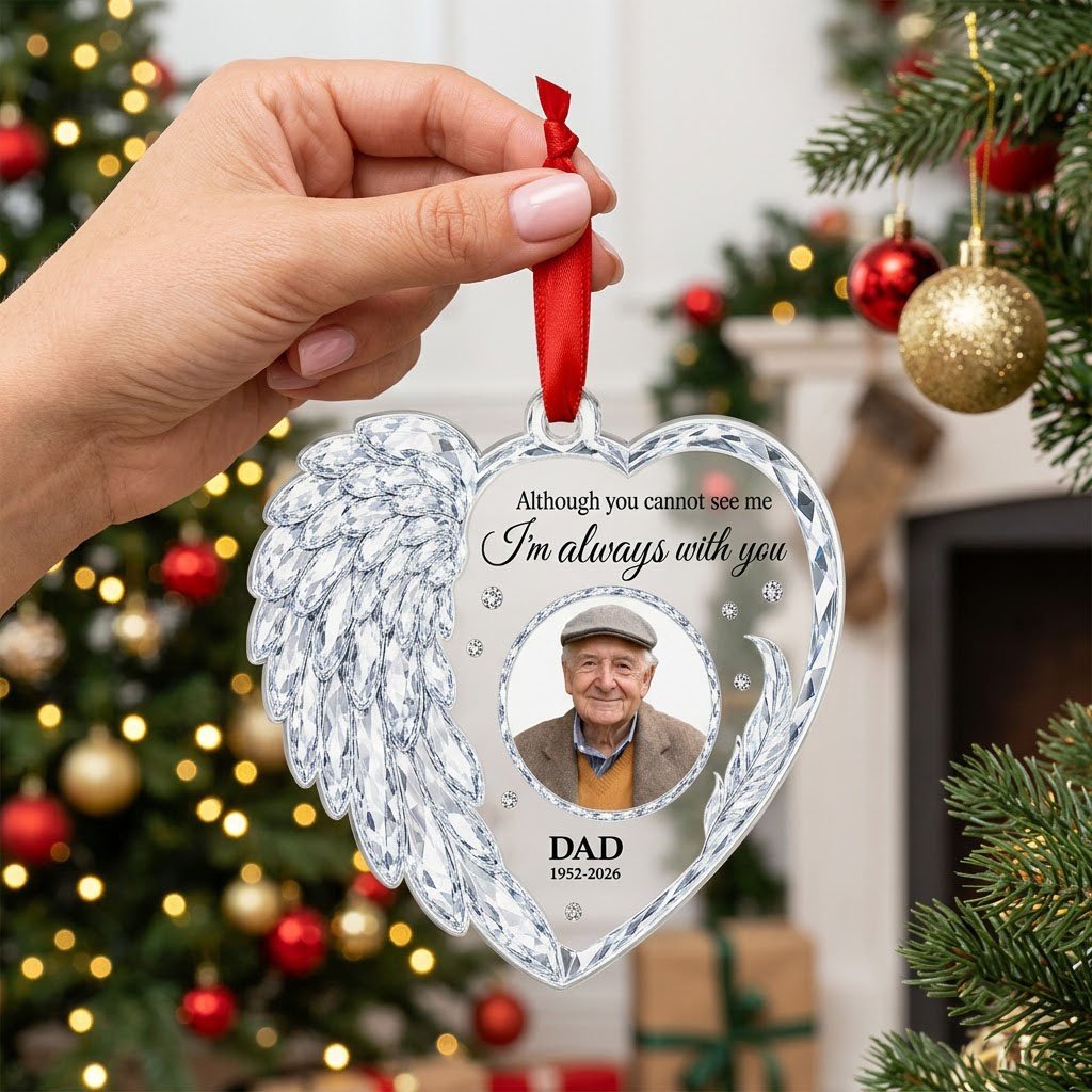 Clear acrylic heart ornament with crystal wing on the left, diamond accents, and a central circular photo frame.