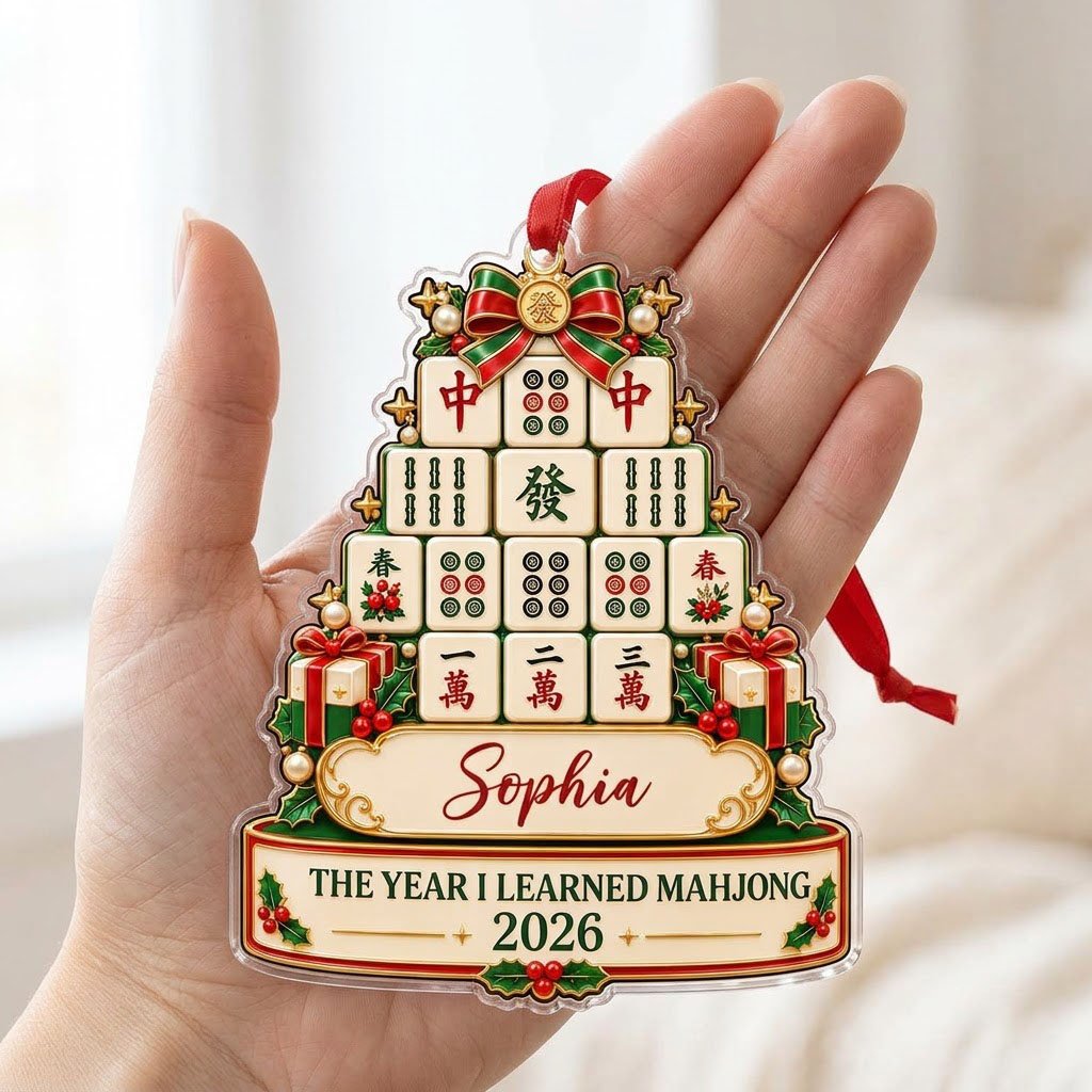 Acrylic tree ornament of mahjong tiles with bow, stars, holly, pearls, and two cream banners for name and year.