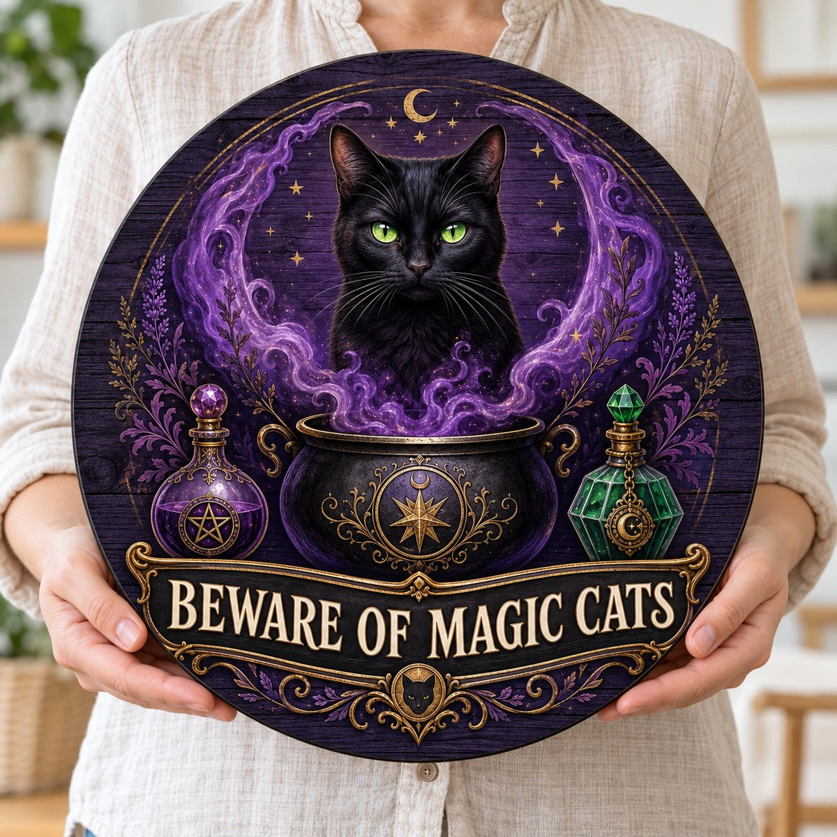 Round wooden sign with a black cat in purple smoke rising from a cauldron and the text BEWARE OF MAGIC CATS.