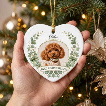 Heart ceramic ornament with dog photo in gold frame, eucalyptus wreath, green bows and 'LOVED BEYOND MEASURE' text