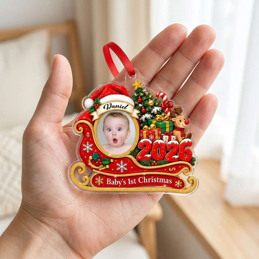 Custom-cut acrylic ornament shaped like a sleigh, reindeer and tree with a photo frame and Baby's 1st Christma text.