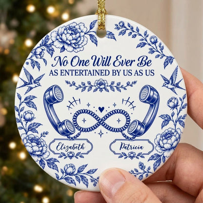 Blue toile round ornament with crown, swallows, vintage phones in an infinity and two name banners
