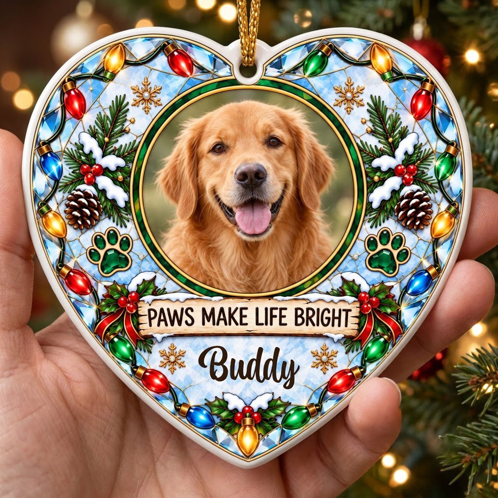 Heart ceramic ornament with dog photo frame, “PAWS MAKE LIFE BRIGHT”, lights, pine branches, paw prints, and red ribbon 