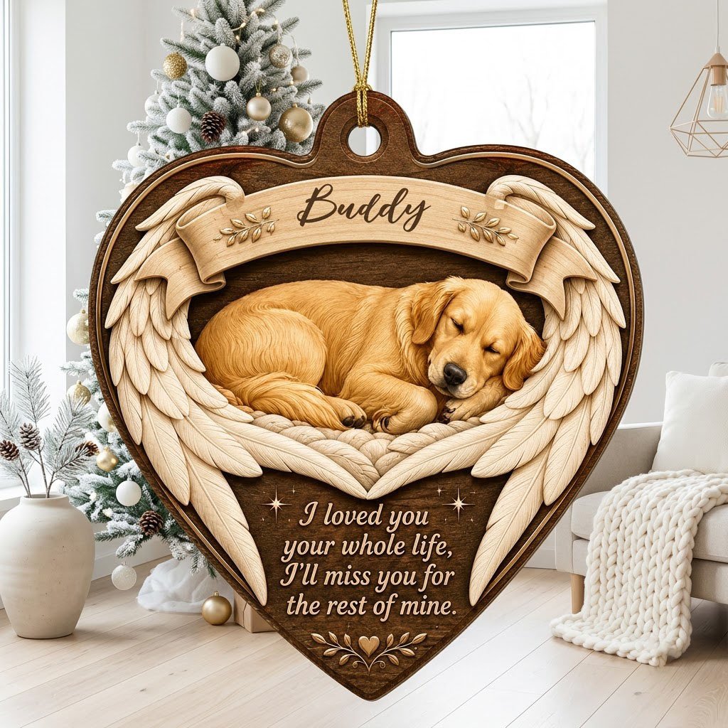 Heart-shaped wood ornament with a sleeping golden retriever, angel wings, ribbon banner, stars, and a memorial quote.