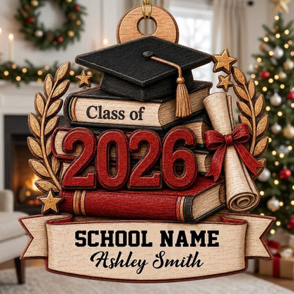 Graduation cap with gold tassel atop books, large 2026 numbers, a red-tied diploma, laurel leaves, stars, and a bottom b