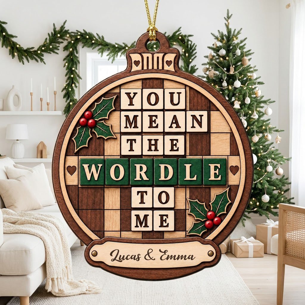 Bauble wood ornament with 'You Mean The Wordle To Me', green WORDLE tiles, holly and personalized names