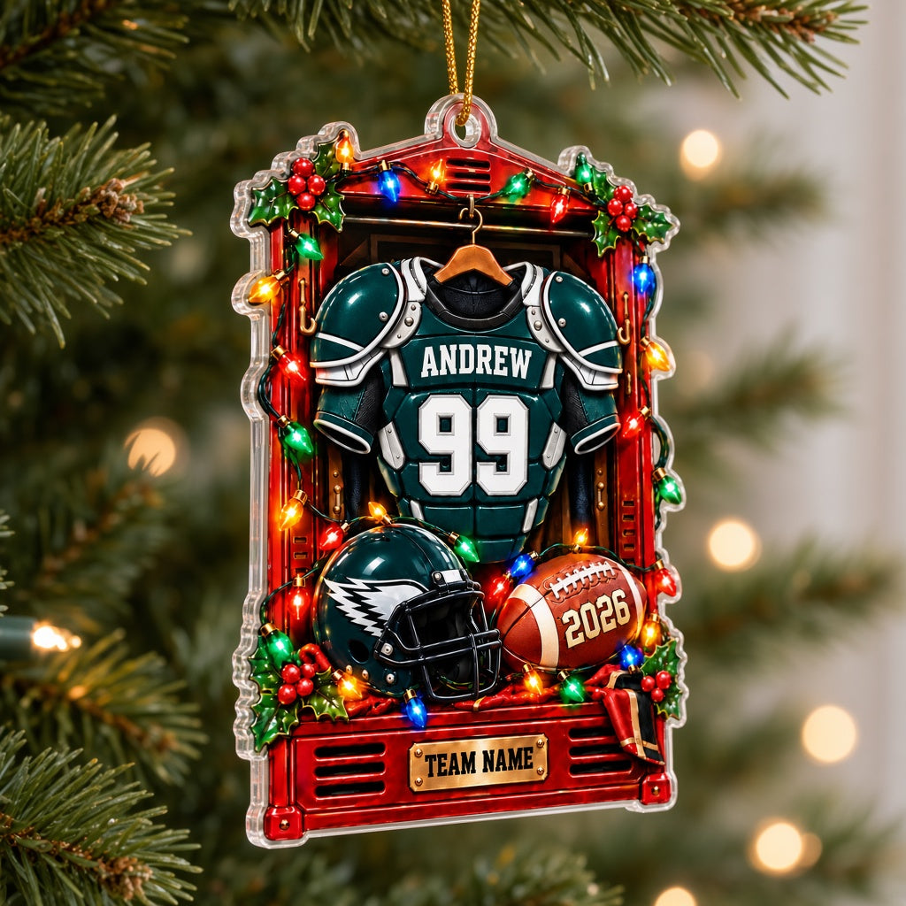 Acrylic ornament of a red football locker with a green jersey, helmet, football, lights and holly for Christmas