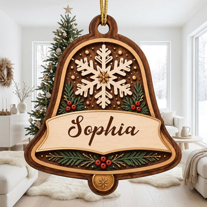 Personalized wooden bell ornament with snowflake, pine sprigs, red berries, and a name on the center banner.