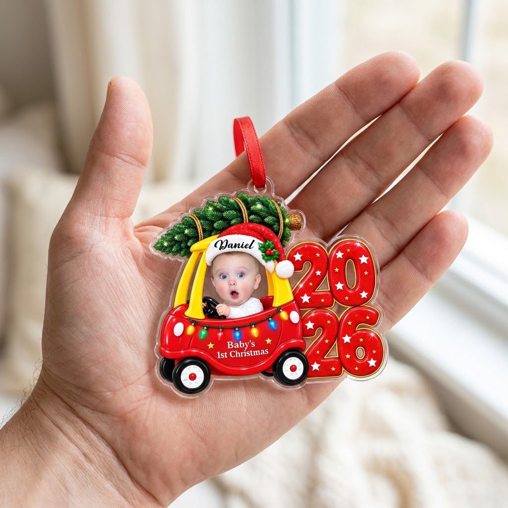 Acrylic ornament shaped like a toy car with tree, Baby's 1st Christmas text, lights, and a baby photo.