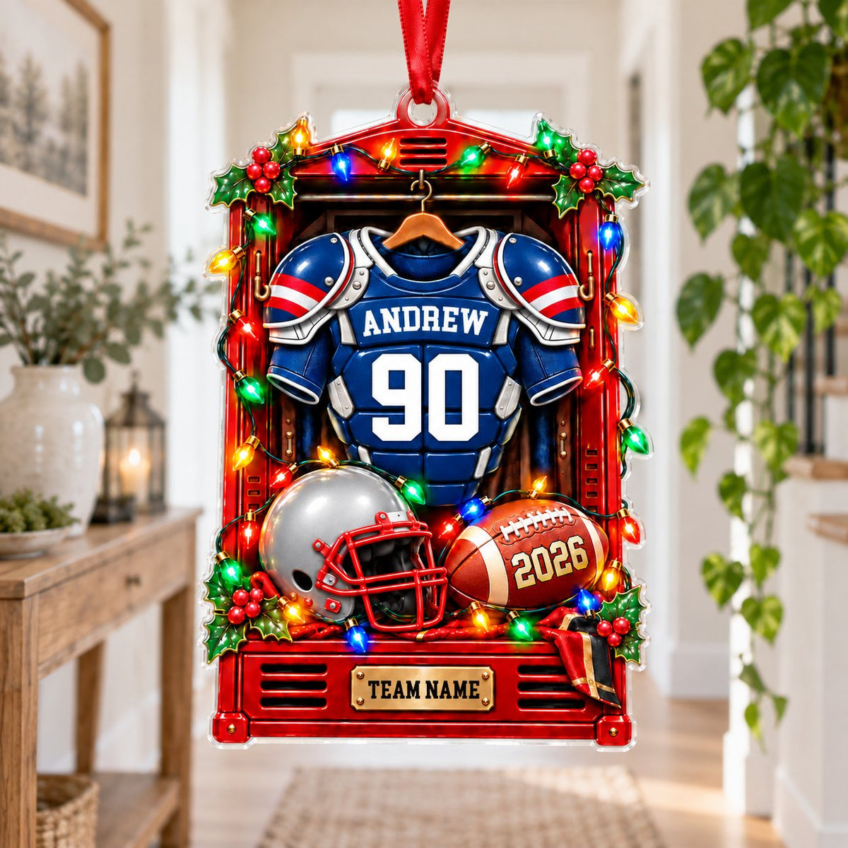 Acrylic ornament shaped like a football locker with jersey, helmet, football, lights and holly, personalized for a playe