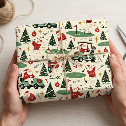 Wrapping paper with Santa Claus golfing, golf carts, trees, ornaments and golf gear on a cream background.