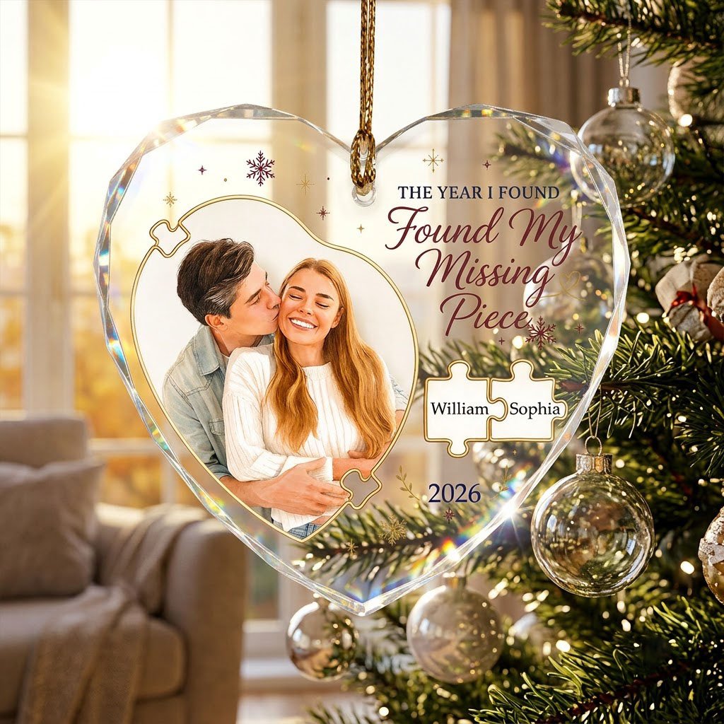 Heart glass ornament with gold puzzle pieces, couple photo, snowflakes, reading THE YEAR I FOUND My Missing Piece.