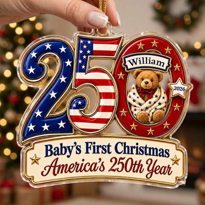 Acrylic ornament shaped like 250 with a teddy bear in the 0 and a gold-trimmed banner for the baby's name and year.
