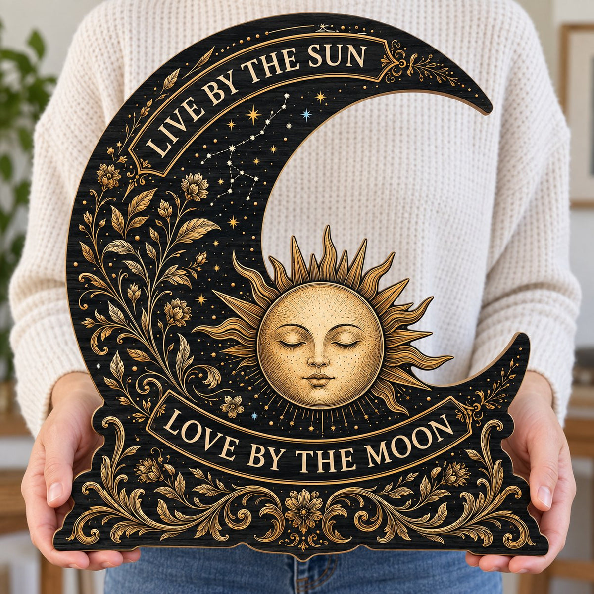 Crescent moon and sleeping sun wooden sign with gold constellations and words Live by the Sun, Love by the Moon.