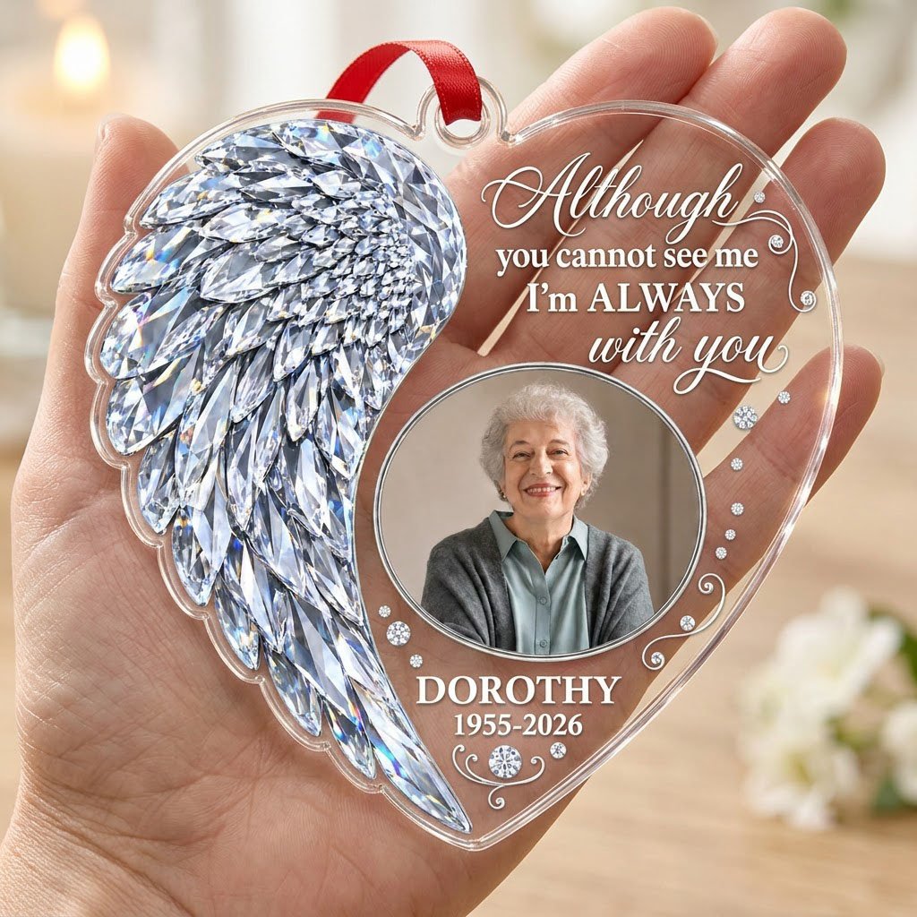 Heart-shaped clear acrylic ornament with crystal-style angel wing, round photo frame, and memorial quote