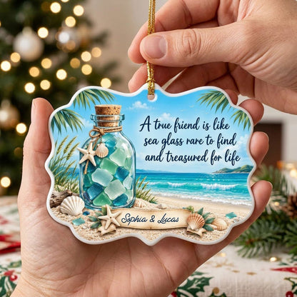 Ornate medallion ceramic ornament with sea glass jar, beach scene, palm branches and a friendship quote for two names.