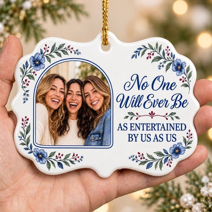 Blue floral ceramic ornament with navy photo frame and the text No One Will Ever Be As Entertained By Us As Us.