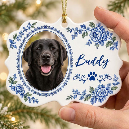 Scalloped medallion ornament with blue-green Delft floral border, dog photo left, blue paw print and name Buddy