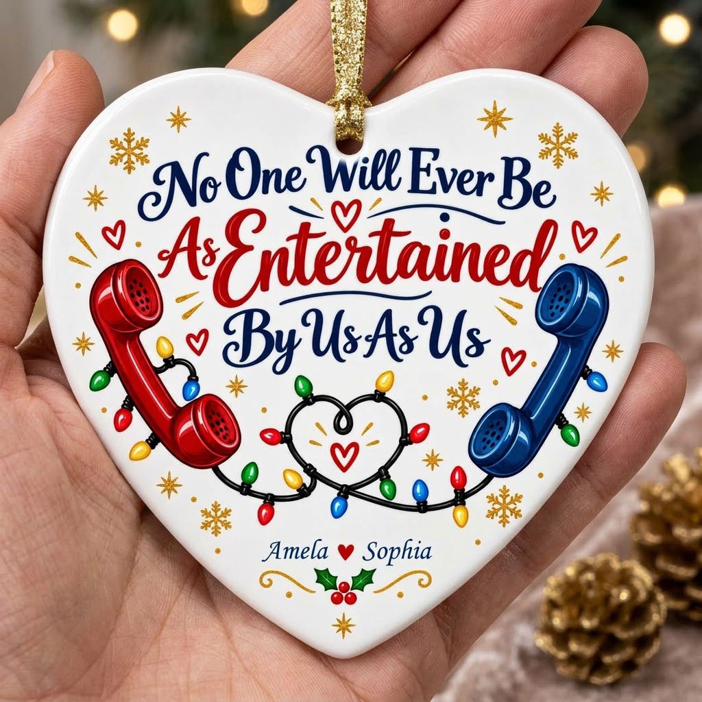 Heart ceramic ornament with red and blue vintage phones, heart-shaped Christmas lights, gold snowflakes and holly.
