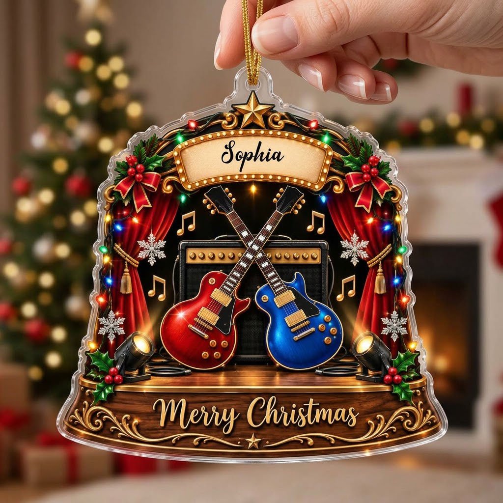 Custom-cut acrylic ornament with crossed red and blue guitars, Merry Christmas marquee, curtains and holly.