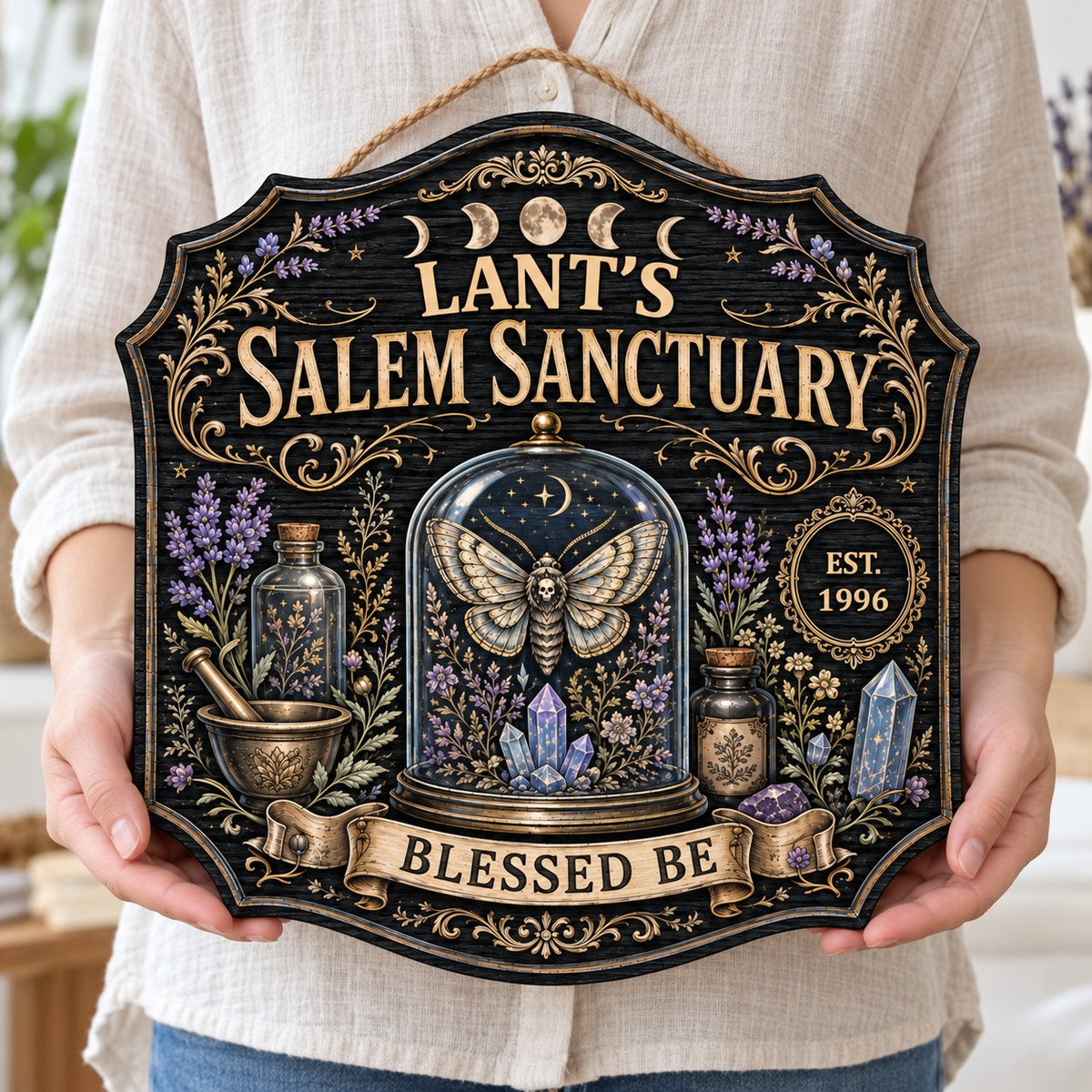 Ornate shield wooden sign with 'Salem Sanctuary,' moon phases, moth, crystals, and personalized name and year.