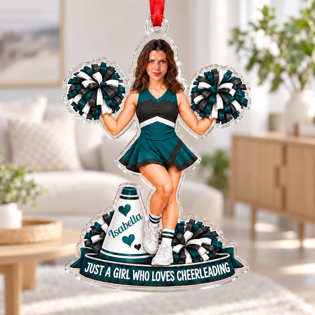Custom-cut acrylic ornament with a cheerleader photo, teal and black pom-poms, megaphone, and a teal name banner.