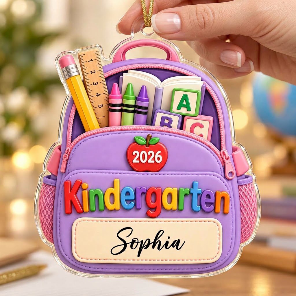Purple backpack acrylic ornament with ABC blocks, apple, Kindergarten text, 2026 year, and a stitched name banner.