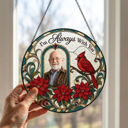 Round stained-glass style suncatcher with arched photo window, red cardinal, three red poinsettias and the words I'm Alw
