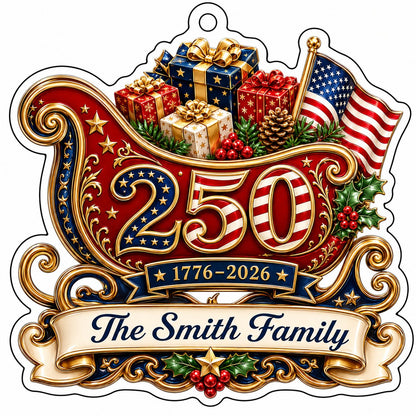 Acrylic ornament shaped like a Santa sleigh with '250', '1776-2026', US flag and a family name banner.