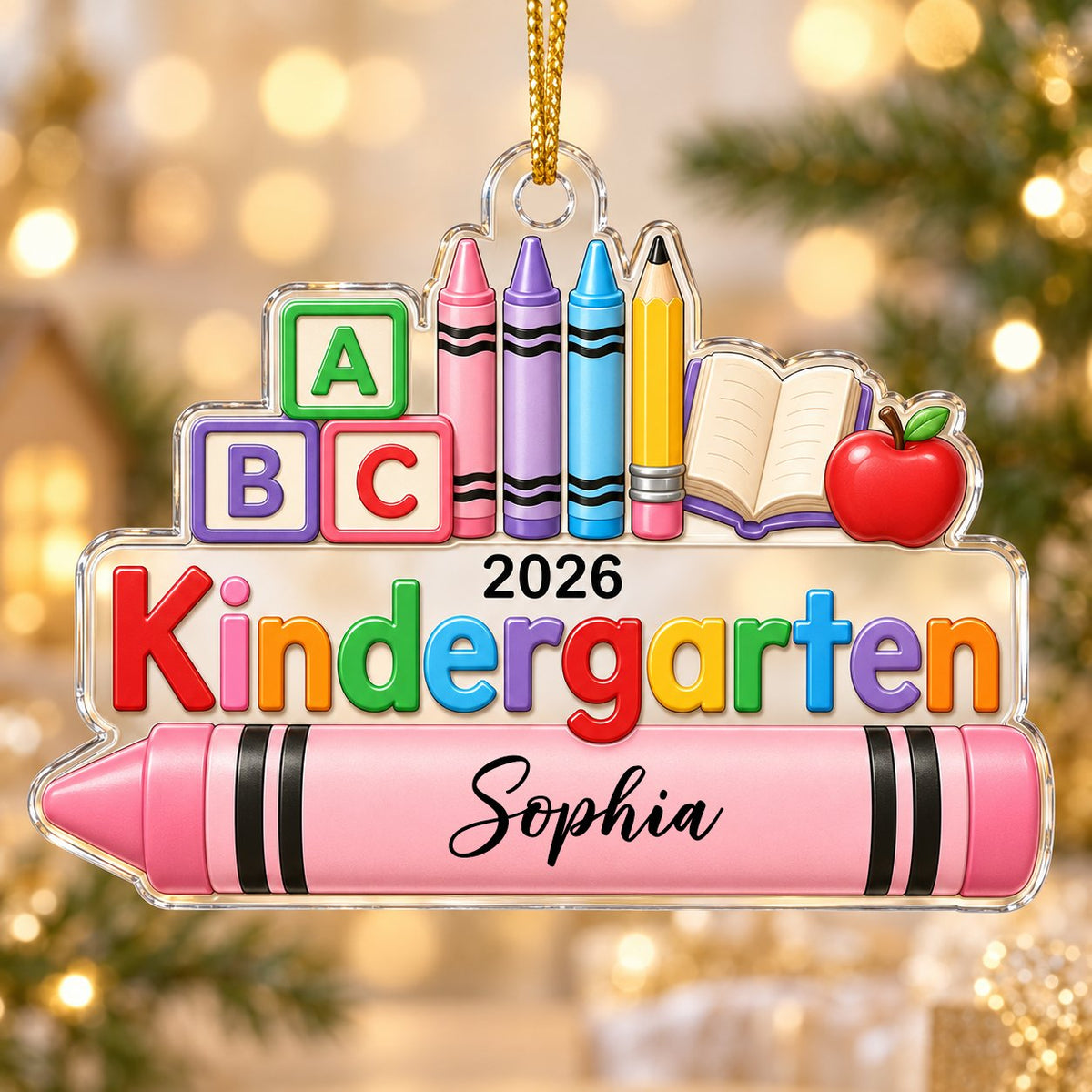 Clear acrylic ornament with ABC blocks, crayons, apple, open book and 'Kindergarten 2026' with a pink name banner