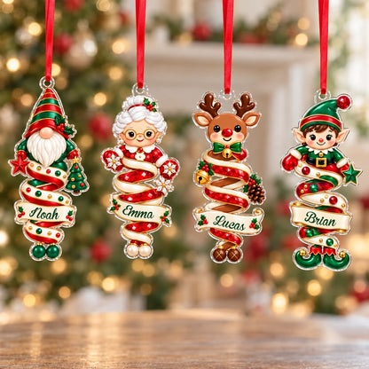 Clear acrylic ornaments shaped like a Christmas gnome and elf in red and green, each personalized with a name.