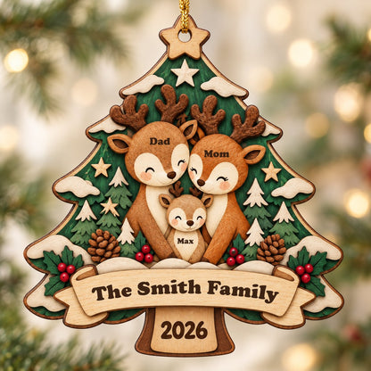 Tree-shaped wood ornament with a deer family, star topper, holly, pinecones, and personalized names and year.